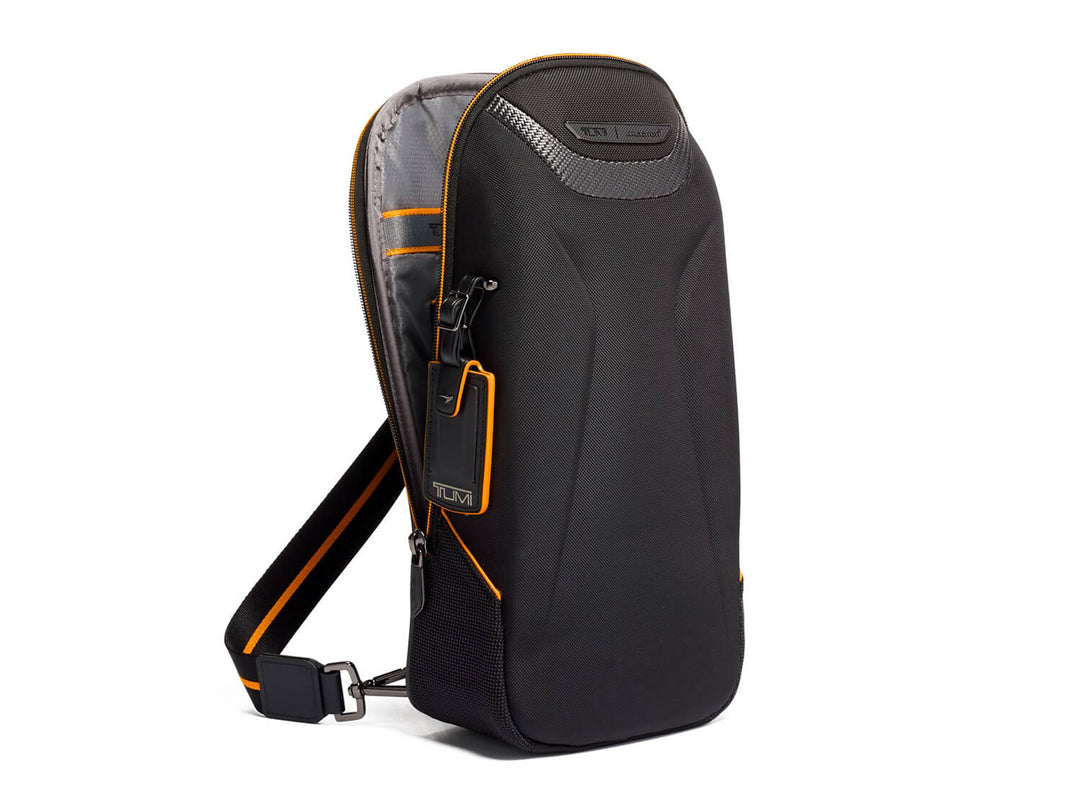TUMI | McLaren Torque Sling, side open#color_black-with-papaya