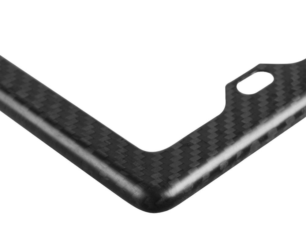 Detail view of matte 3K twill weave carbon fiber corner highlighting sophisticated finish