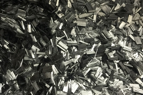 Chopped carbon fibers. Source: ACP Composites | What is Forged Carbon Fiber? The Ultimate Guide To Forged Composites