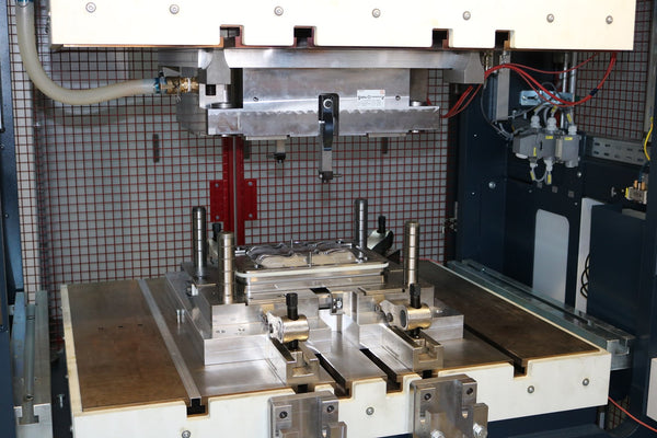 Langzauner hydraulic presses, producing carbon fiber SMC parts | What is Forged Carbon Fiber? The Ultimate Guide To Forged Composites